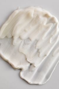 Kaboompics - Layered Cream Texture Close-Up on Soft Neutral Background
