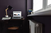 Kaboompics - Dark Home Office Desk Beside a Bright Window