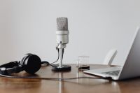 Kaboompics - ASMR Desk Setup with Studio Microphone, Headphones, Coffee and Laptop