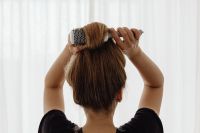 Kaboompics - Round Brush Styling Long Hair from Behind