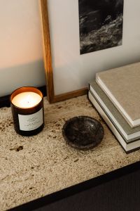 Kaboompics - Black Console with Open Drawer and Decorative Lower Shelf