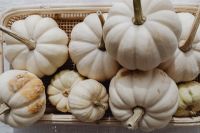 Kaboompics - Wicker Tray Filled with White Mini Pumpkins
