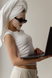 Kaboompics - Social Media Manager Planning Content While Wearing Face Mask