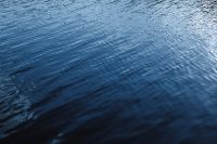 Kaboompics - Deep Blue Water with Diagonal Wave Reflections, Dramatic Abstract Background for Creative Projects