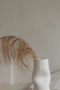 Minimalist Home Decor with Dried Palm Leaves in a White Vase