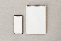 Kaboompics - Overhead Smartphone and Blank Card Mockup on Beige Linen