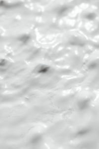 Kaboompics - Bright White Paint Texture with Raised Ripples and Soft Macro Highlights