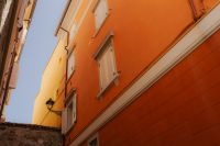 Kaboompics - Historic Stone Passage Between Warm-Toned Italian Buildings