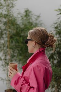 Kaboompics - Side View of Woman in Pink Trench Coat and Sunglasses
