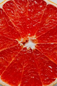 Kaboompics - Vertical Grapefruit Macro Close-Up for Citrus Ingredient Backgrounds