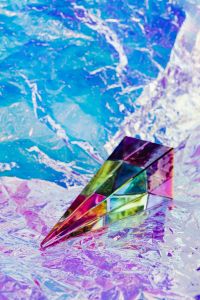 Kaboompics - Rainbow Prism Lying on Holographic Foil for Creative Campaign Design
