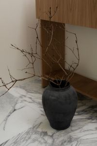 Kaboompics - Wabi Sabi Interior with Large Branch Vase and Marble Floor