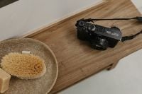 Kaboompics - Fujifilm X100VI Camera on Wooden Desk