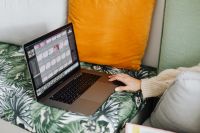 Kaboompics - A woman who works with a laptop computer at home