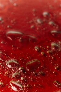 Kaboompics - Red Liquid Bubble Macro Texture