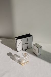 Kaboompics - Chanel Shopping Bag, Perfume Bottle and Box in Sunlight