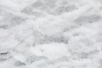 Kaboompics - Fluffy Fresh Snow Surface with Subtle Garden Color Beneath, Abstract Winter Texture