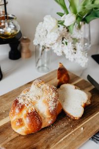Kaboompics - Challah Loaf, Toast, Honey, and Flowers on Breakfast Board