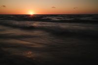 Kaboompics - Orange Sunset Over a Dark Sea