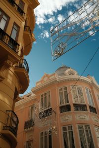 Kaboompics - Ornate Pink Malaga Building with Street Decorations