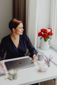 Kaboompics - Happy casual beautiful woman working on a laptop
