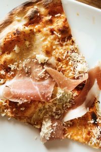 Kaboompics - Pizza with Prosciutto on the white plate