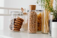 Kaboompics - Close Arrangement of Cookies, Chickpeas and Pasta in Glass Pantry Storage Jars