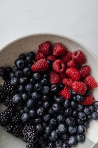 Kaboompics - Mixed Berries Arranged in a Ceramic Bowl from Above