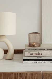 Kaboompics - Neutral Lamp and Candle Still Life with Interior Design Books