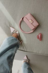 Kaboompics - Pink Handbag with Pink Sunglasses and Bow Clip