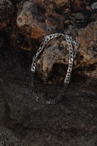 Kaboompics - Silver Chain Loop Styled on Volcanic Rock