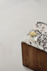 Kaboompics - Overhead Lemon Water on a Veined Marble Surface