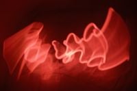 Kaboompics - Red Neon Light Streaks with Dynamic Motion Blur