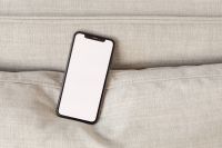 Kaboompics - Diagonal Smartphone Mockup with Wide Beige Copy Space