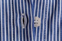 Kaboompics - Blue Striped Cotton Shirt Buttonhole with Mother-of-Pearl Button