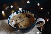 Kaboompics - Cup of coffee, book, fairy lights