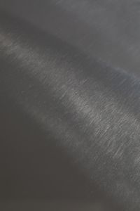 Kaboompics - Dark Gray Textured Wall with Soft Diagonal Light