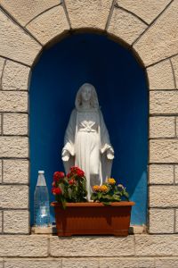 Kaboompics - Virgin Mary Shrine With Flowers in an Italian Village