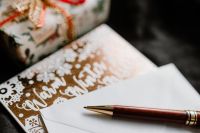 Kaboompics - Close-Up Christmas Card, Envelope and Wooden Pen