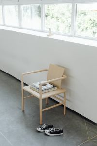 Kaboompics - Wooden Chair with Books, Magazines and Sneakers
