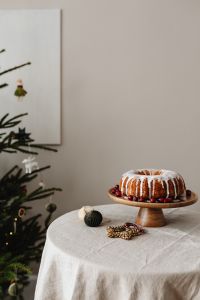 Kaboompics - Minimal Christmas Table with Bundt Cake and Tree