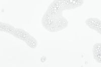Kaboompics - Sparse Soap Foam Islands on White with Generous Copy Space, Minimal Background