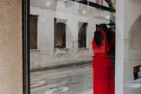 Kaboompics - Residential houses in traditional architecture style, red dress