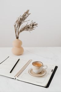 Kaboompics - Coffee - Weekly Planner & Vase on Marble