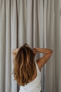 Kaboompics - Back View of Woman with Long Hair and Arms Raised