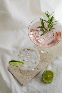 Kaboompics - Clear Lime Cocktail and Pink Rosemary Cocktail