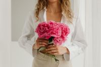 Kaboompics - Woman Holding a Pink Peony Bouquet in White Shirt