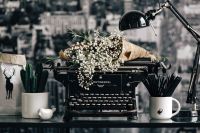 Kaboompics - Vintage Typewriter And Stationery On A Rustic Desk