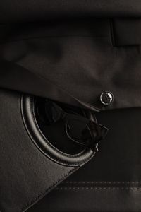 Kaboompics - Black Handbag, Sunglasses and Black Boots Flat Lay