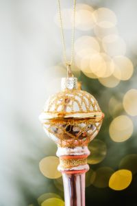 Kaboompics - Hanging Gold Ornament with Soft Tree Lights